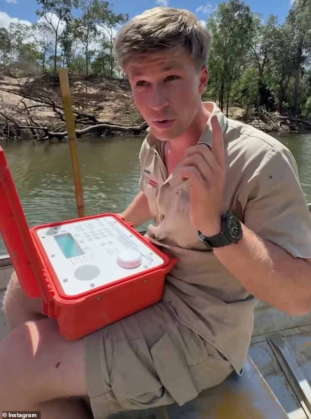 He explained that he uses a VR100 to check if the crocodiles he finds have already been tagged