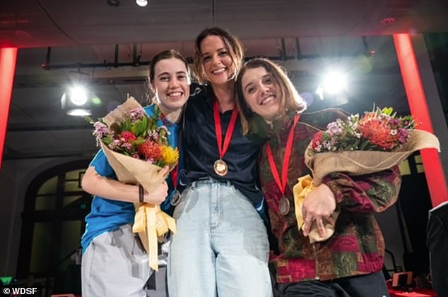 Rachael Gunn (centre) is pictured after winning the Oceania qualifying event, which saw her break through for Australia in Paris.