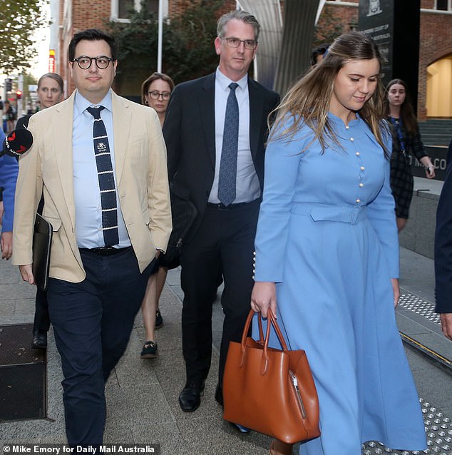 Brittany Higgins (right) and David Sharaz (left) were pictured leaving the David Malcolm Justice Centre in Perth on Wednesday night after a nine-hour mediation. Just hours later, she would be heading to hospital.