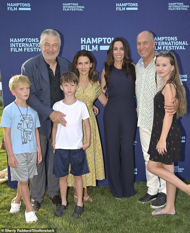 Alec and Hilaria were joined at the event by four of their seven children: Carmen, 10, Rafael, nine, Leonardo, seven, and Romeo, six. (Pictured from left are Leonardo, Alec, Rafael, Hilaria, Abigail Pollak, Stuart Suna and Carmen)