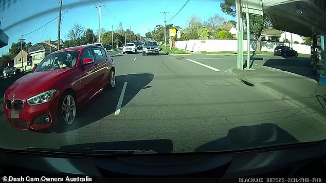 Dozens of motorists criticised the driver of the BMW (pictured) for trying to accidentally overtake the other vehicle, while some blamed the male driver for not giving way.