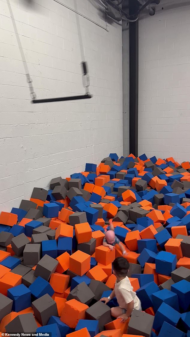 Reighlynn then let go and fell 10 feet into the foam pit, sobbing as she landed face first, before immediately trying to do it again