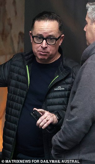 Outside his $20 million Sydney apartment on Thursday with husband Shane, Alan Joyce declined to comment