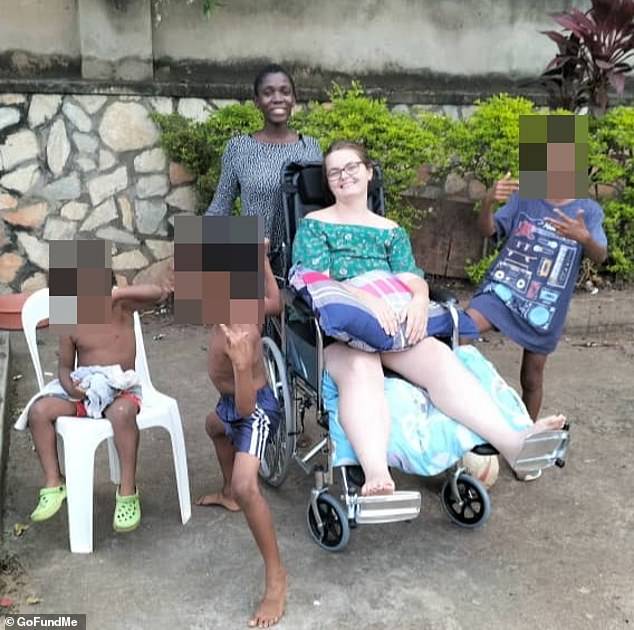 Mrs Makanda (pictured centre) was recently discharged from John Hunter Hospital but she still has a long road to recovery and is unsure if her body will ever return to normal.