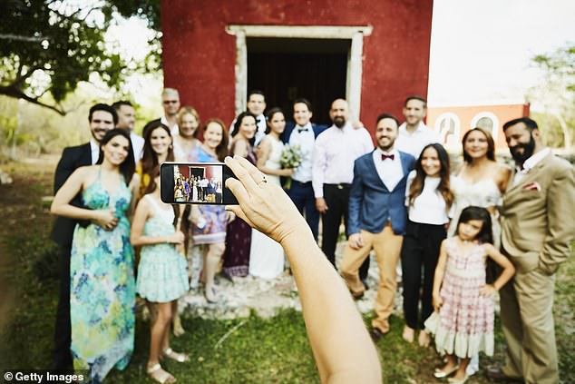 The bride and groom created a joint wedding album using the Dots Memory app. This app allowed guests to take photos on their phones and share them with all the guests. Pictured: stock photo