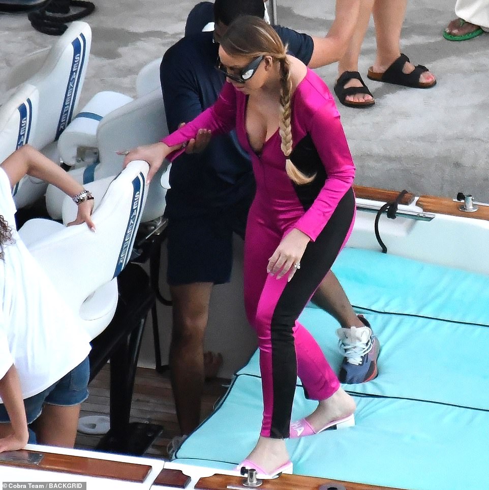 Mariah slipped into a pair of open-toe pink and white pumps as she spent quality time with her twins in Italy