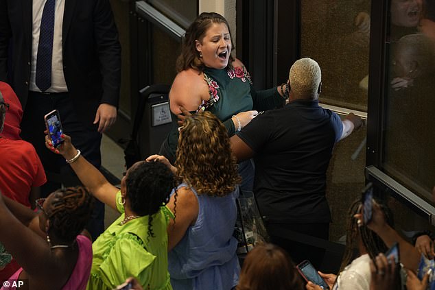 A protester is removed from the Biden-Harris event in Maryland. Pro-Palestinian protesters also drowned out the president during his speech in an overflow room