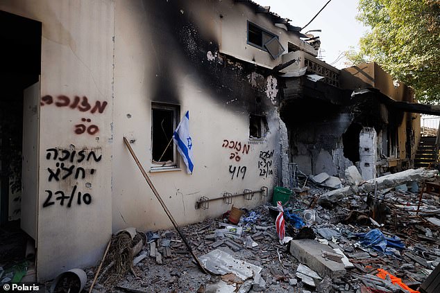 Damage to a building in Kibbutz Be'eri in Israel after Hamas attacks on October 7