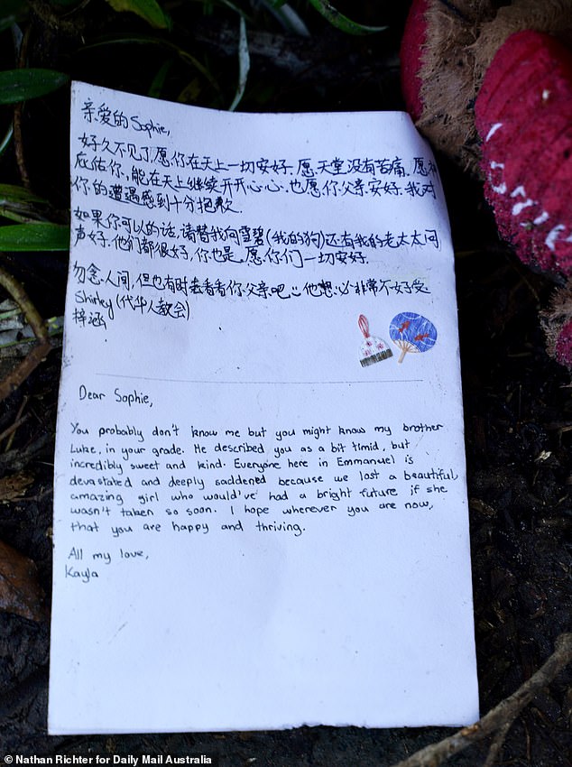 Grief-stricken children laid flowers, candles and heartfelt messages for their classmate, who was previously described as the 'smartest girl in school'