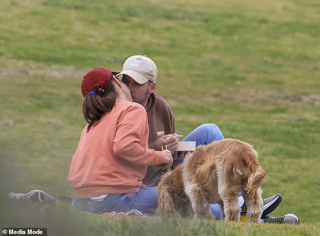 The actress and her new man looked completely in love last month as they enjoyed an oceanside picnic at Clovelly in Sydney. The couple couldn't keep their hands off each other, kissing and cuddling as they sat on a picnic blanket