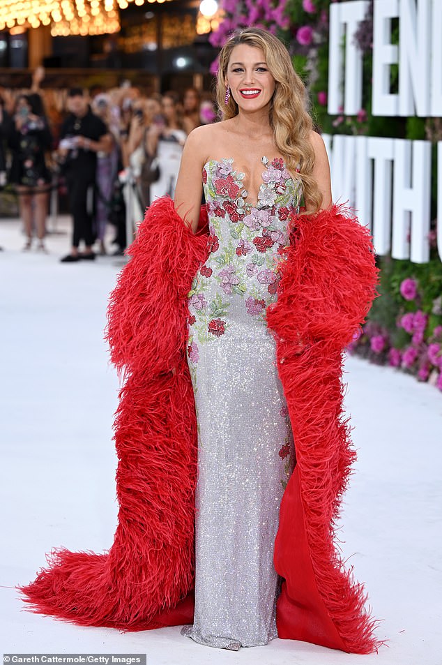 Lively wore a glamorous, silver, strapless gown covered in ornate, multi-colored floral embellishments for the screening