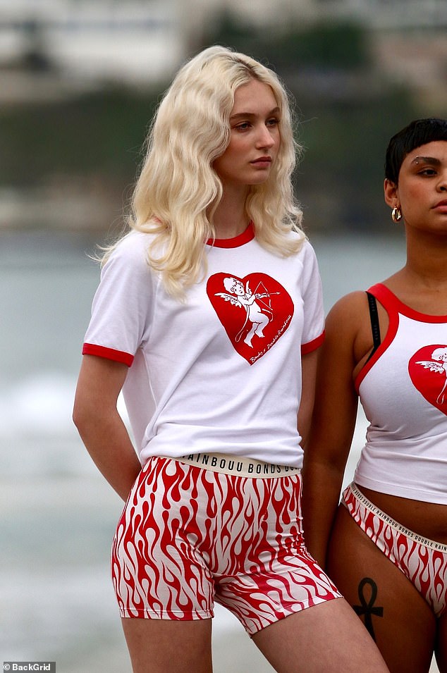 Later in the shoot, the aspiring model also wore a white T-shirt with a red heart and a white cherub, which matched her red and white flame Bonds underwear