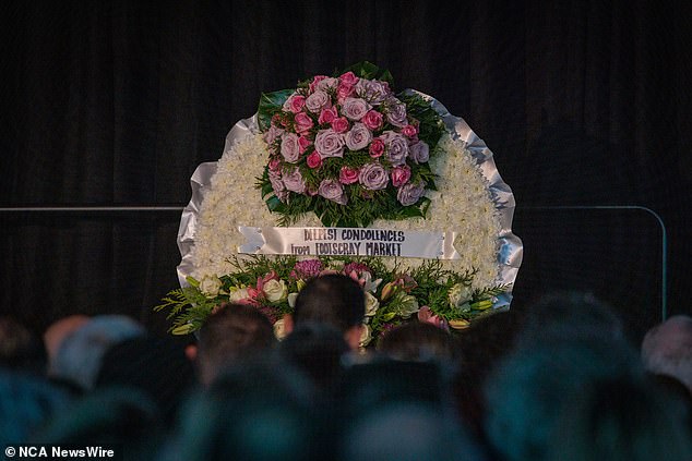 A bouquet of flowers was donated by the Footscray Markets for Mrs Carter's funeral service