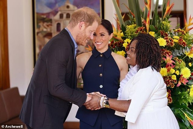 Prince Harry shakes hands with Ms Marquez as a smiling Meghan looks on. The Duke and Duchess stayed at the residence for half an hour, where the Vice President expressed her thanks for the couple's official visit