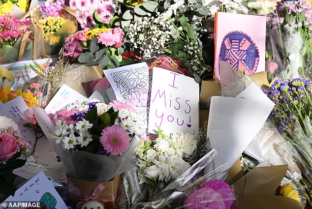 Sophie's classmates and others from Emmanuel College laid flowers and cards at a memorial site at the school