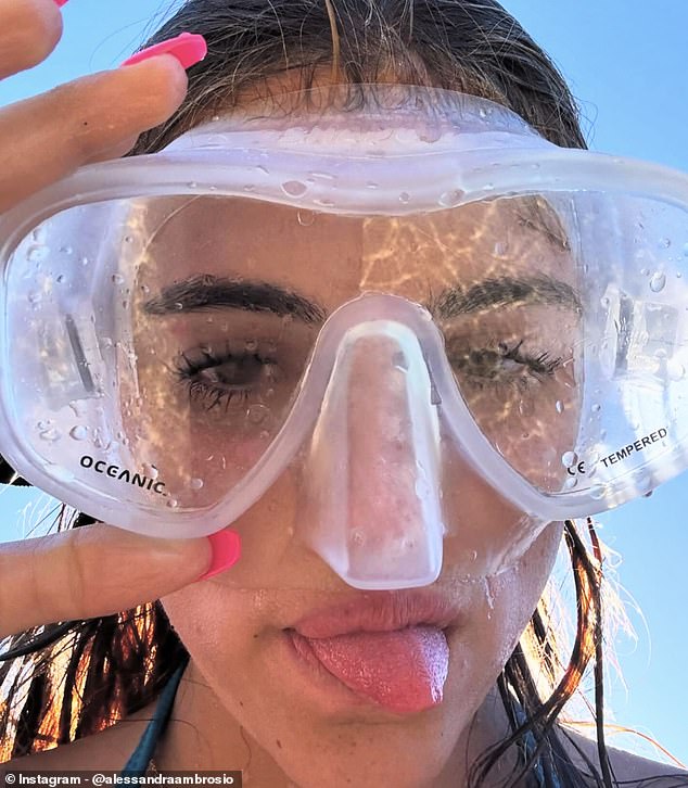 Alessandra made the most of her trip and took a close-up selfie with a large, clear diving mask, indicating that she was going snorkeling.