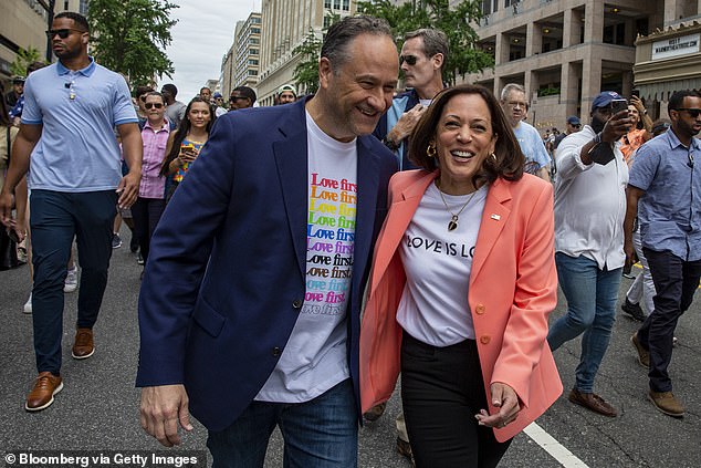 Vice President Kamala Harris, center right, and Second Gentleman Doug Emhoff, center left, attend the Capitol Pride Walk and Rally in Washington, D.C.