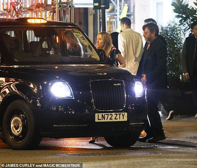 The pair were then seen getting into a black taxi to head home after the rare night out together.