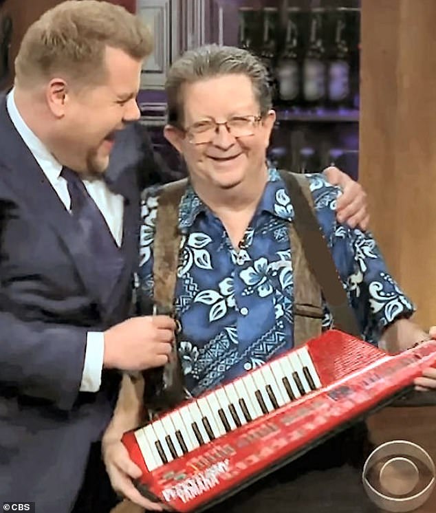 The star is pictured with James Corden on The Late Late Show in 2018