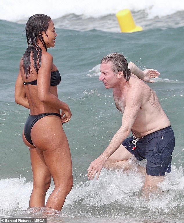 Emma showed off her incredible bikini body as she soaked up the sun with her husband Ceawlin