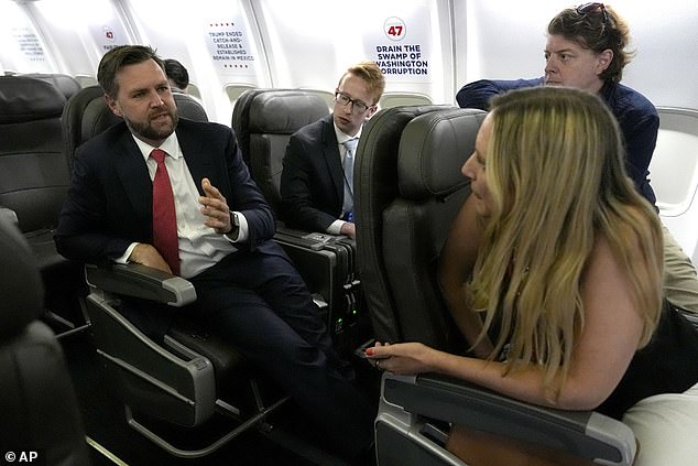 Vance talks to reporters on his plane during a campaign trip to Virginia last month