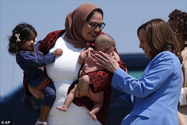 Kamala Harris greets Durham County Commissioner as she arrives in Raleigh for her economic speech on August 16, 2024