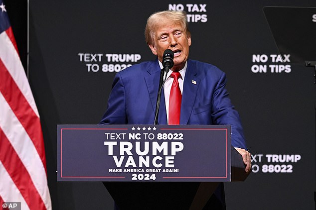 Former President Donald Trump speaks in Asheville, NC on August 14, 2024. The Republican presidential candidate accuses Harris of copying his proposal to end the tax on tips for service workers, which he introduced earlier this year in Nevada. Last week, Harris supported ending the tip tax at a rally in Las Vegas