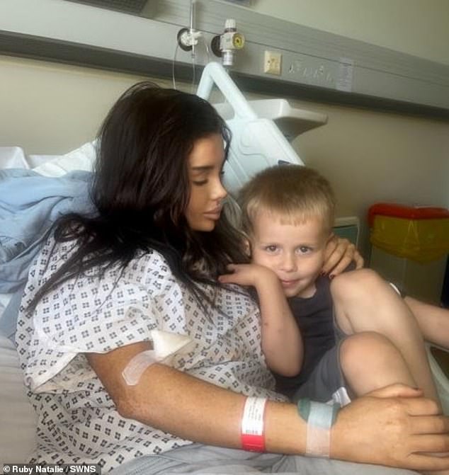 Under the guidance of 999, JJ gently placed his mother in the recovery position and monitored her breathing (pictured with his mother in the hospital)