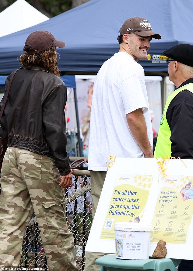 The Panthers halfback couldn't stop beaming as he wandered the markets with Fowler