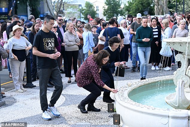 Thousands of people turned out for a candlelight vigil for Sophie Wang and stayed long after the vigil ended