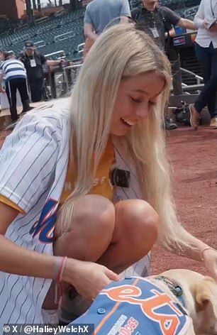 She petted a dog named 'Buddy'