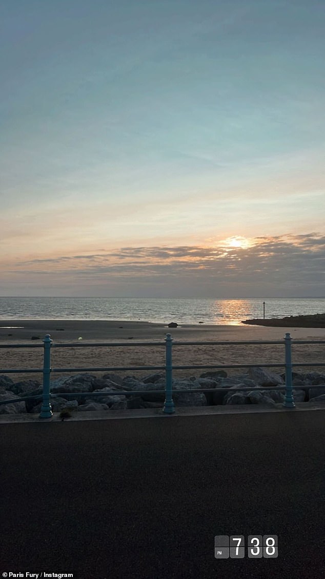 In an update on Instagram, Paris, 34, went for a walk along the coast with some friends