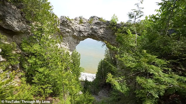 Mackinac Island is also home to breathtaking natural wonders, including Arch Rock, one of the island's most popular photo spots (pictured)