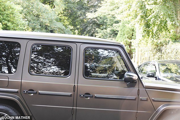 The 25-year-old Love Island star was photographed behind the wheel of her Mercedes-AMG G 63 Magno Edition near her Cheshire home, before heading out for a drive with her 19-month-old daughter.