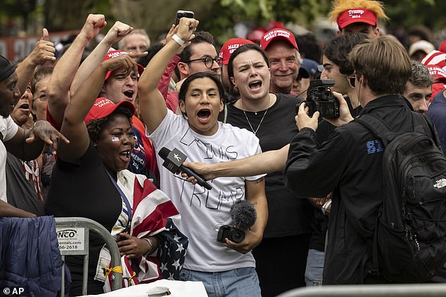 Trump supporters gather before a campaign rally in the Bronx borough of New York in May of this year