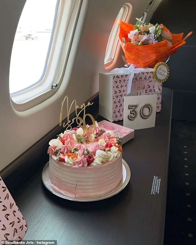 Gifts were seen on board, including a bouquet of flowers and a cake