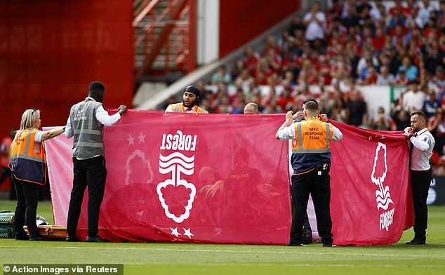 A protective screen was temporarily placed around Danilo while he received treatment on the field