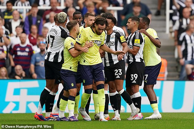 A scuffle broke out as Newcastle players reacted angrily to the decision