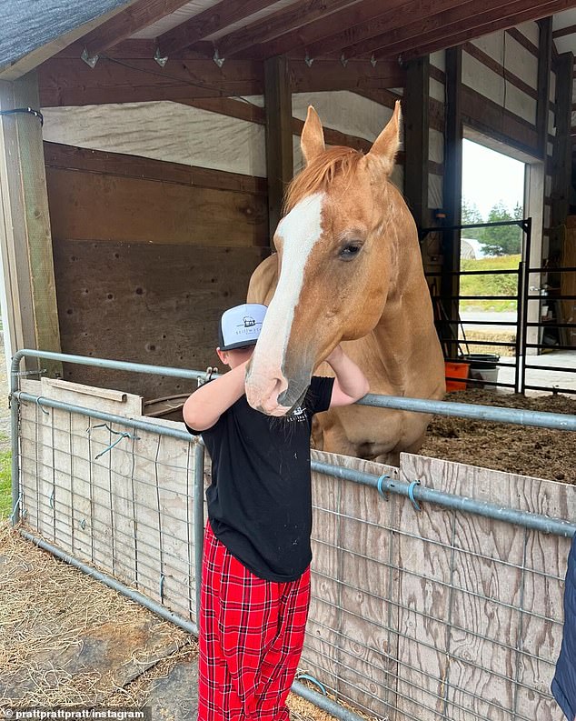 The former Parks and Recreation employee also shared a photo of Jack petting a horse