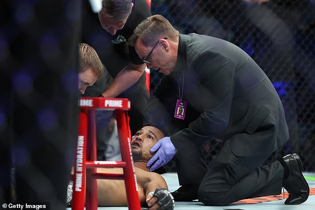 Australian Stewart Nicoll looked lifeless on the mat (pictured) during the undercard of UFC 305 when he was choked unconscious by Jesus Aguilar