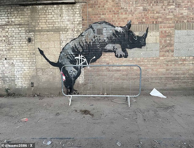 Banksy's recent rhino mural was vandalized shortly after its discovery on Monday