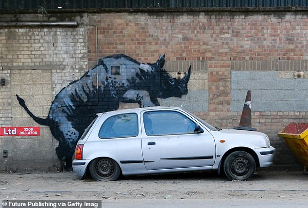 Banksy's rhino mural originally featured a smashed up silver car that was part of the artwork