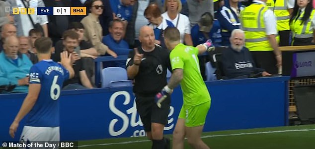 Jordan Pickford rushed over to Hooper to protest, with Everton trailing 1-0