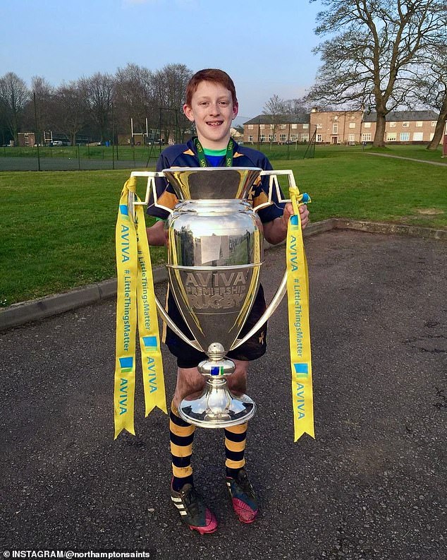 Northampton shared a photo of a young Hendy holding the Premiership trophy