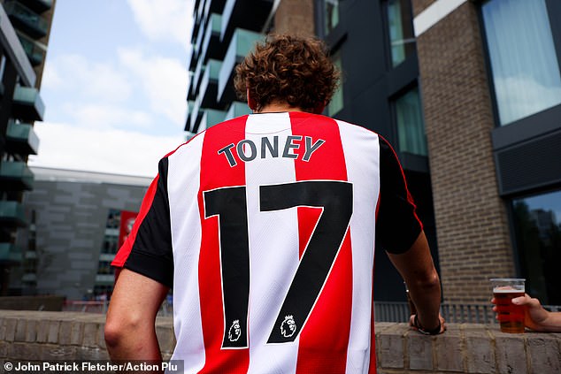 A fan in the photo is wearing a shirt with the name of Ivan Toney, who did not play on Sunday