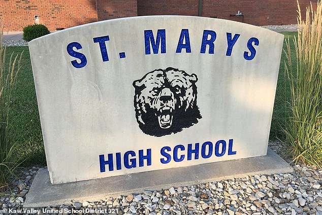 The alleged abuse occurred at St. Mary's Junior and High School in Kansas, after the teaching assistant was assigned to 'CB' to help with his special needs