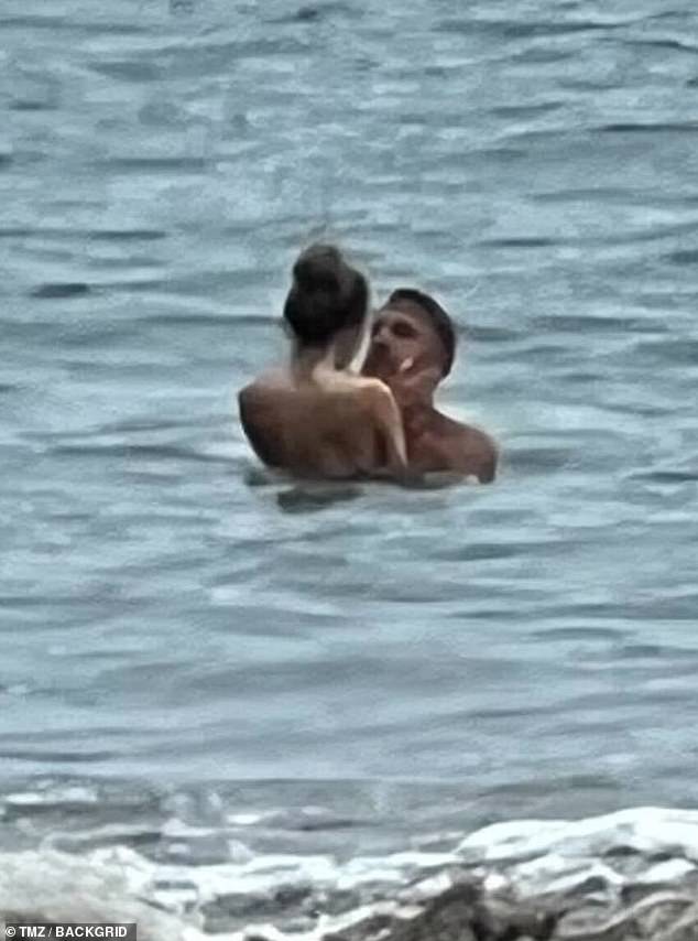 The couple appeared to be enjoying some private time alone in the waves