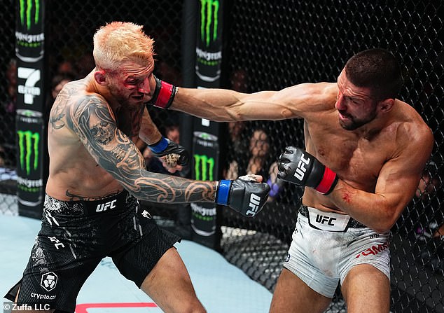 Hooker (left) didn't win many fans with his tattoos, but they were very impressed with his victory over Gamrot (right) in a fight that earned him the fight of the night award.