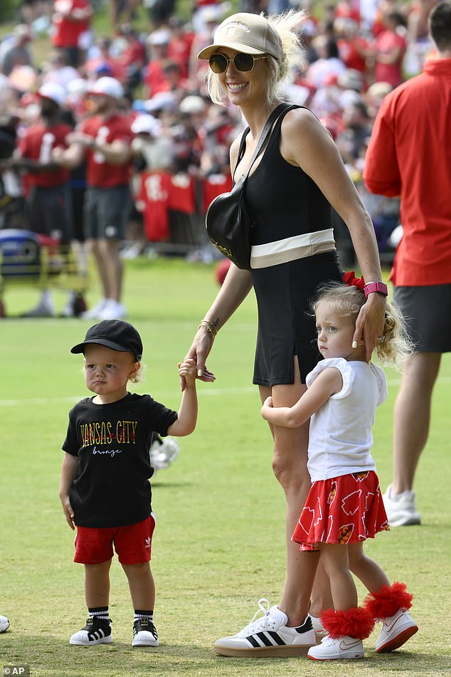 Sterling and Bronze are pictured last month with mom Brittany as they wait for Patrick after an NFL football training camp in Missouri