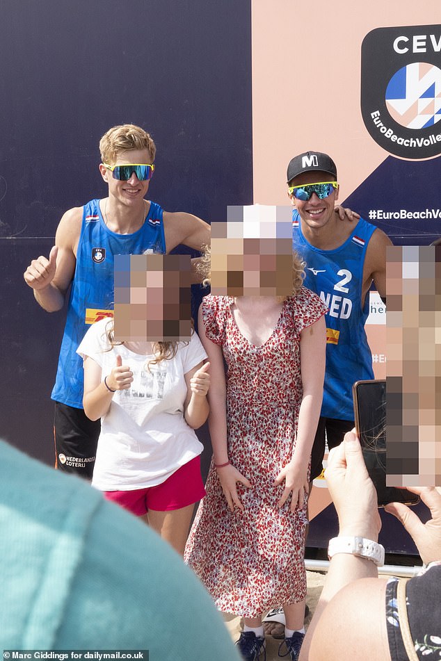 The 30-year-old Dutchman was attending the European Beach Volleyball Championships in the Netherlands, where he received a rock star welcome, with parents encouraging their children to take photos with the embarrassed athlete.